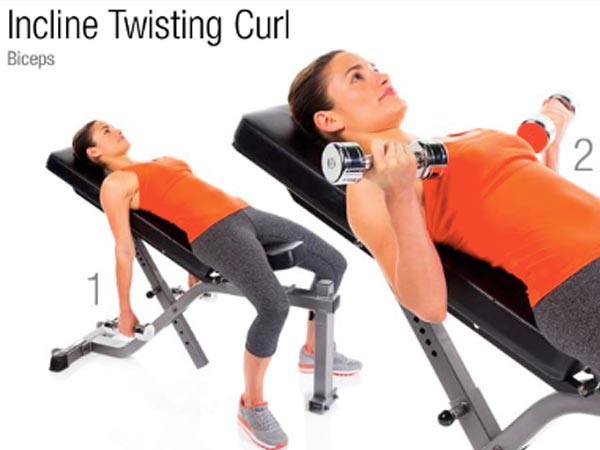 woman doing Incline Twisting Curl