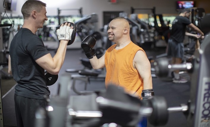 AF member working out with coach