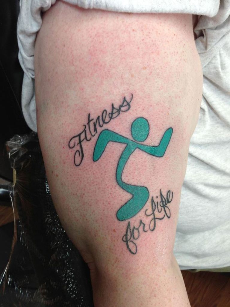 Why in the World Would Anyone Get a Tattoo of Their Gym's Logo? We'll Tell You! - Anytime Fitness