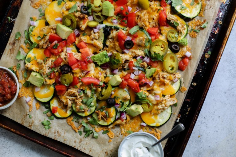 Sheet pan of zucchini chicken nachos.