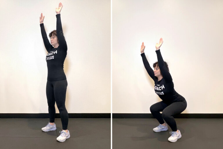 Coach standing upright goes into a squat with arms raised above her head.