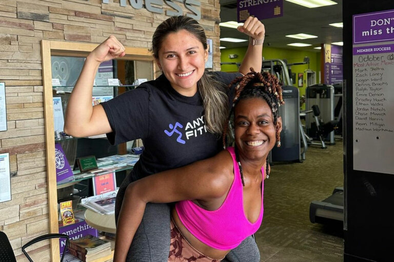 Jasmine giving Coach Maria a piggyback ride.