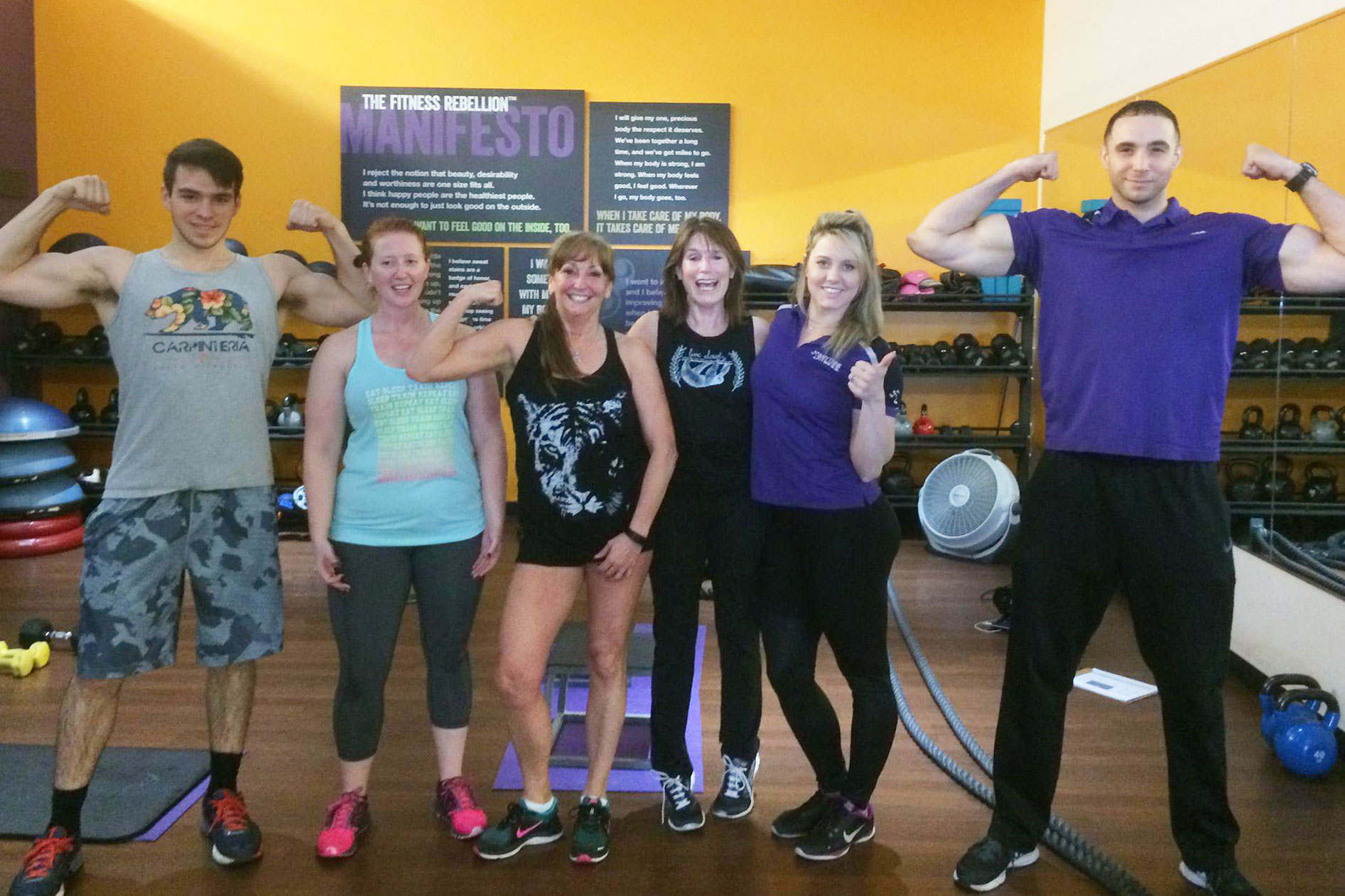 Jaymie posing with her gym buddies.