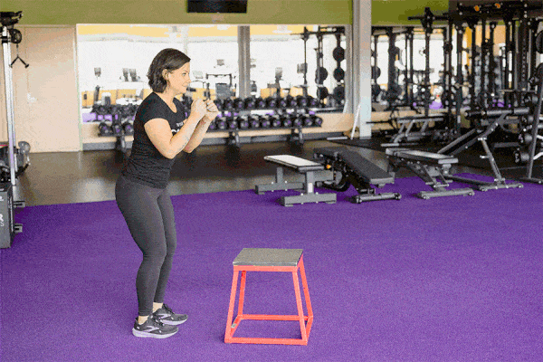 Coach Heather demonstrating an 18-inch box jump.