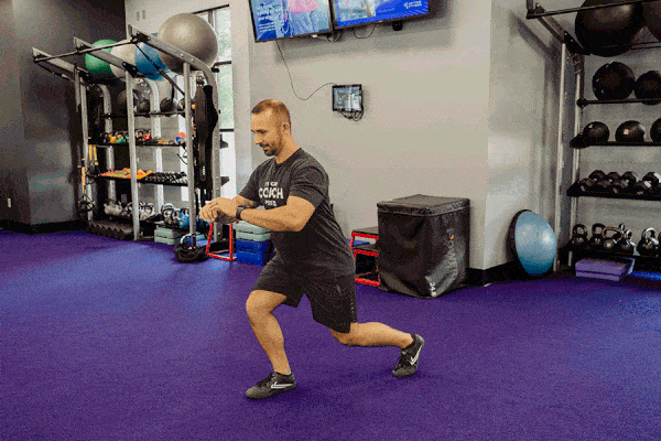 Coach Mike demonstrating alternating jump lunges.
