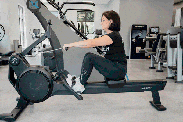 Coach Heather demonstrating a complete rowing movement.
