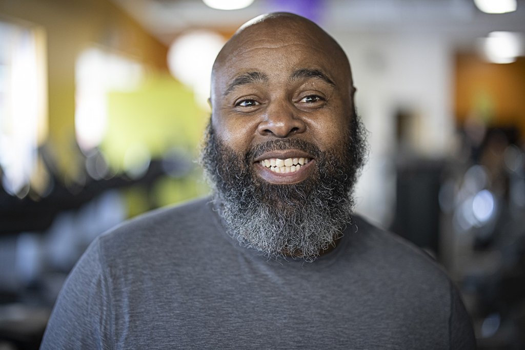 Mark smiling in the gym.