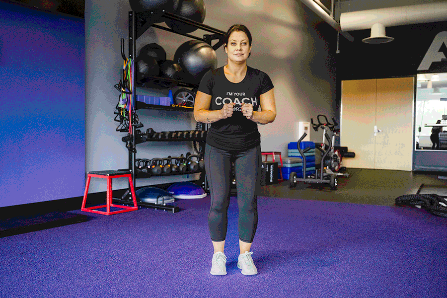 Coach Heather demonstrating side-to-side mini hops.
