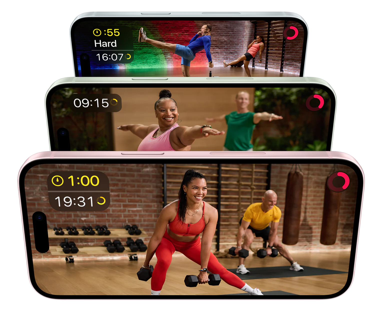 Three phones with workout videos playing