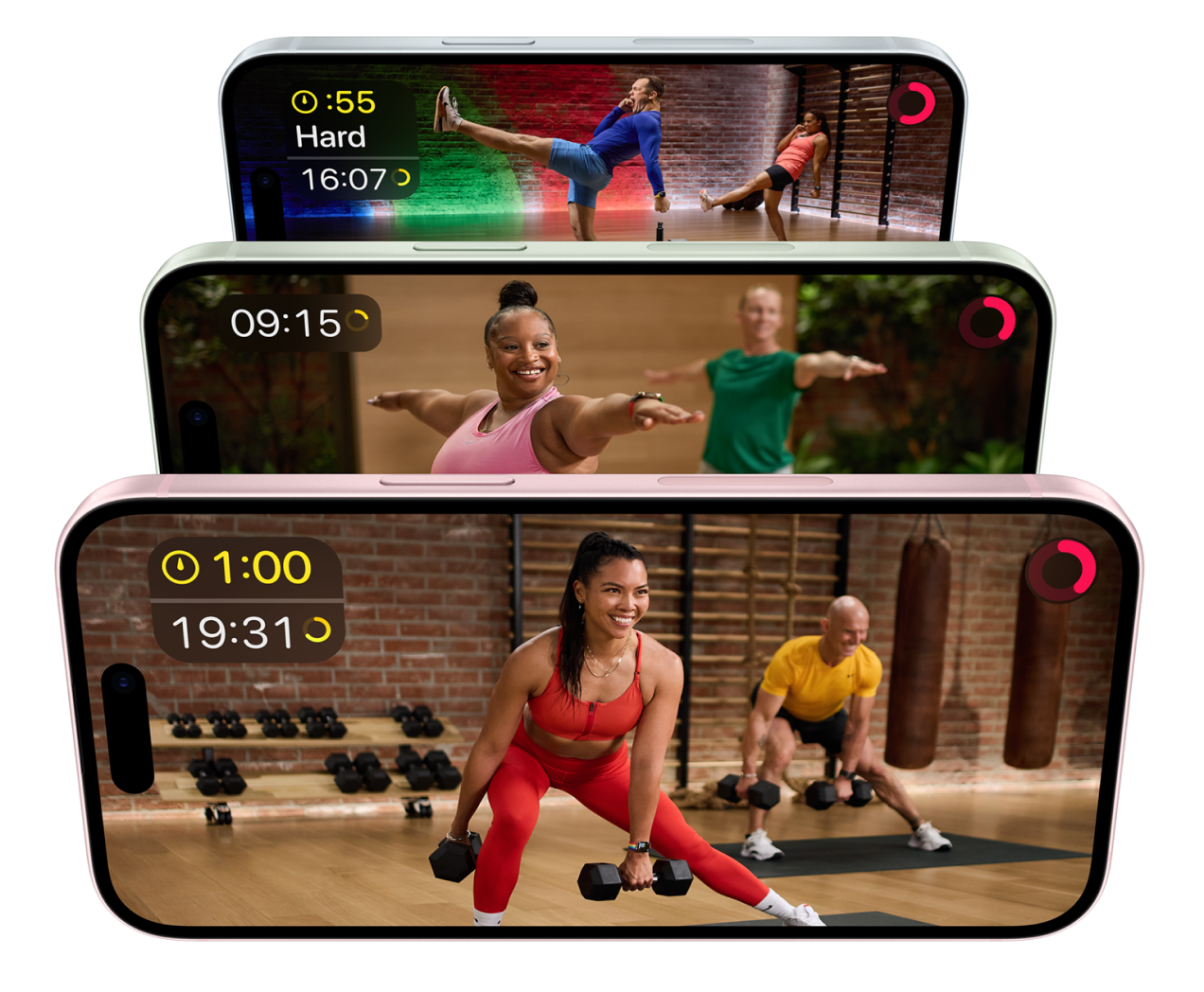 Three stacked iPhones showing Apple Fitness+ workouts