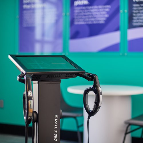An Evolt 360 body scanner sitting in a fitness consultation room at a gym.